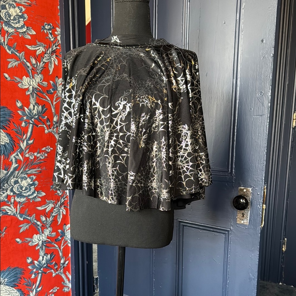 Blackmilk silver spiderwebbed cheerleader skirt in Large